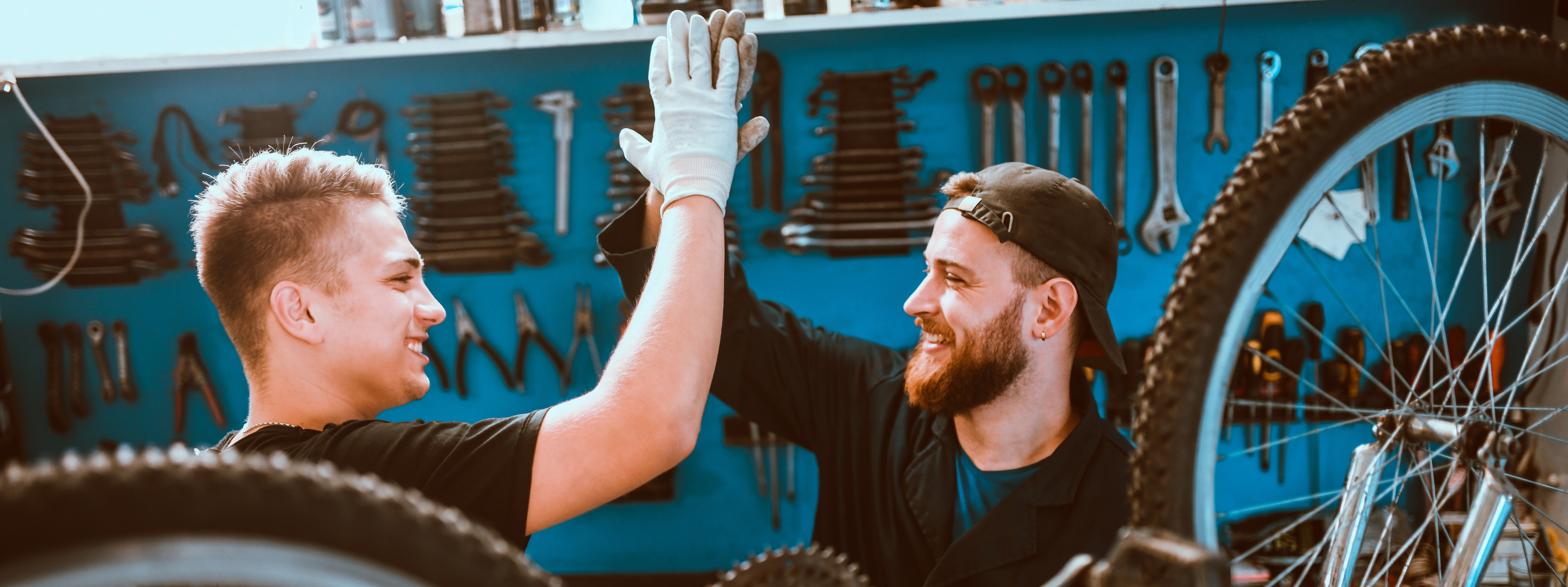 two men in a bike shop