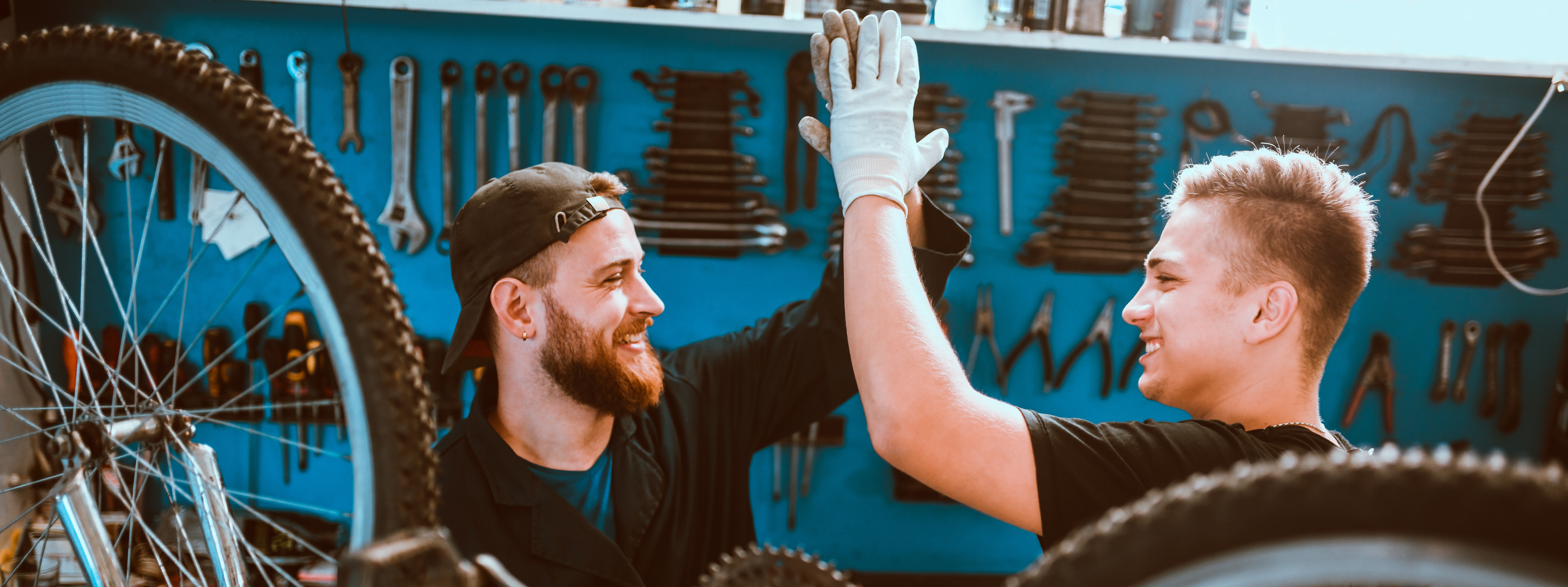 two men in a bike shop