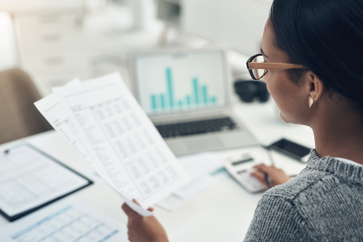 woman looking over her finances