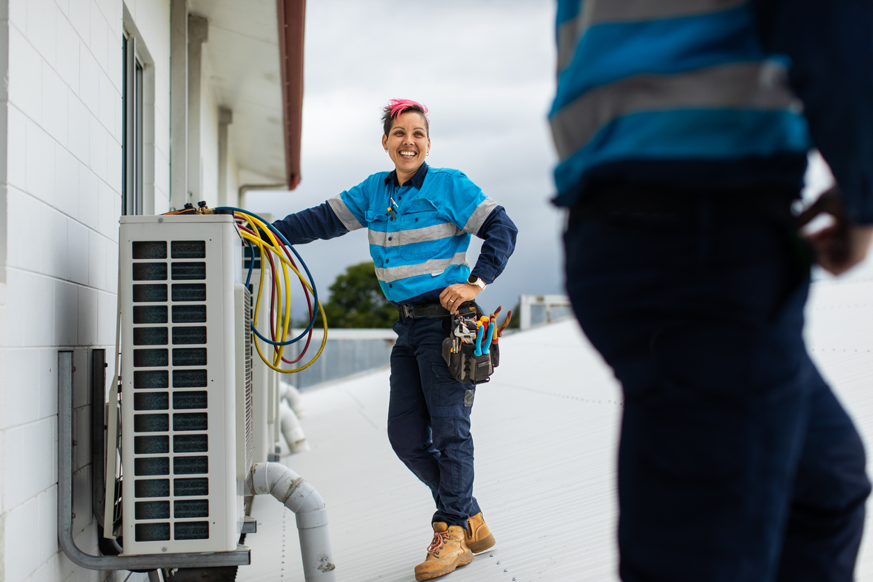 Female tradie smiling