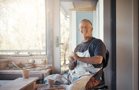 Mature aged worker doing pottery