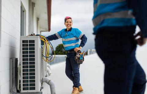 Female tradie smiling